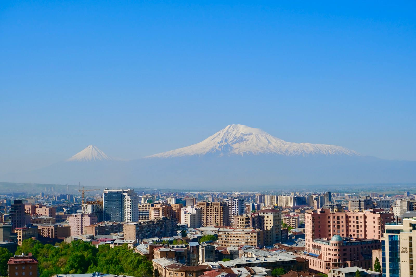 The snow-capped twin peaks of Mount Ararat rising over the city of Yerevan