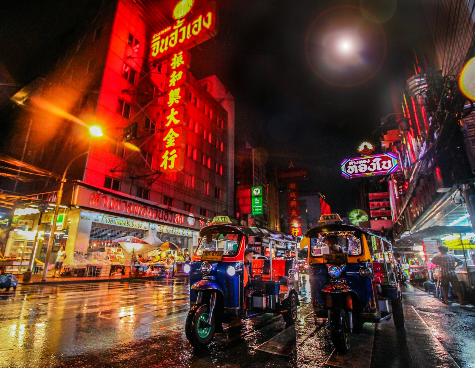 Tuk-tuks on a street in Bangkok's Chinatown