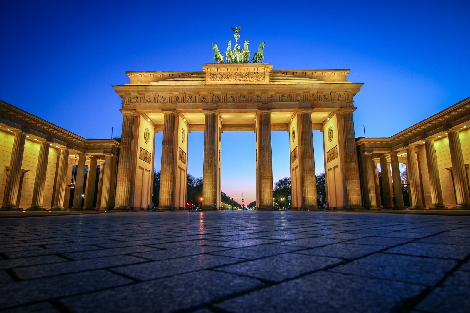 The Brandenburg Gate illuminated at night in Berlin, Germany