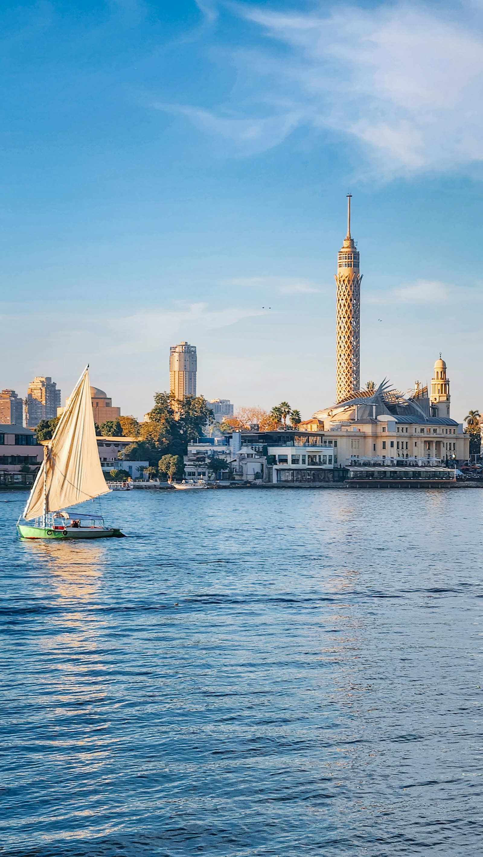 A felucca on the Nile with the Cairo Tower behind
