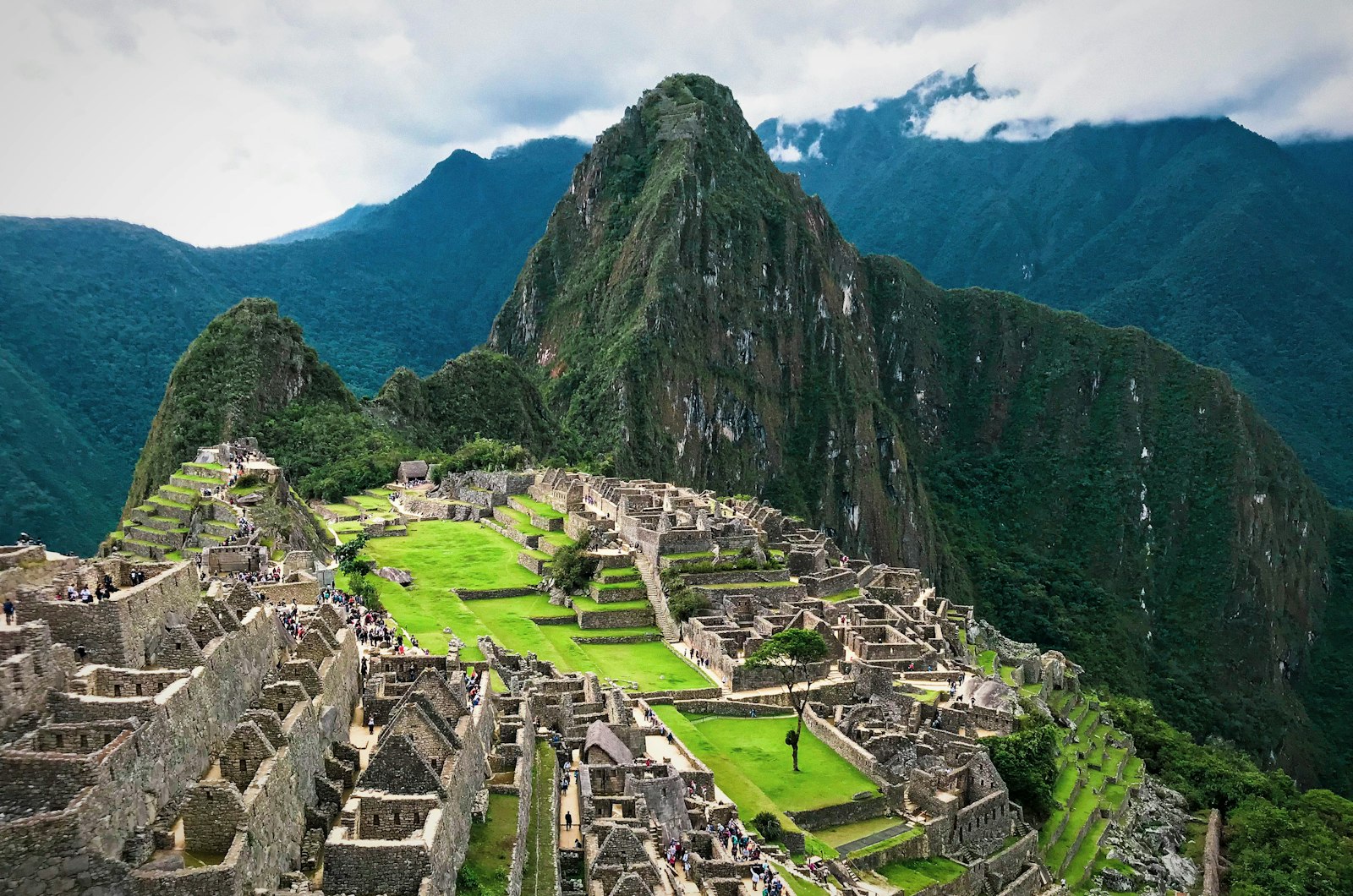 The Inca ruins of Machu Picchu among green Andean peaks