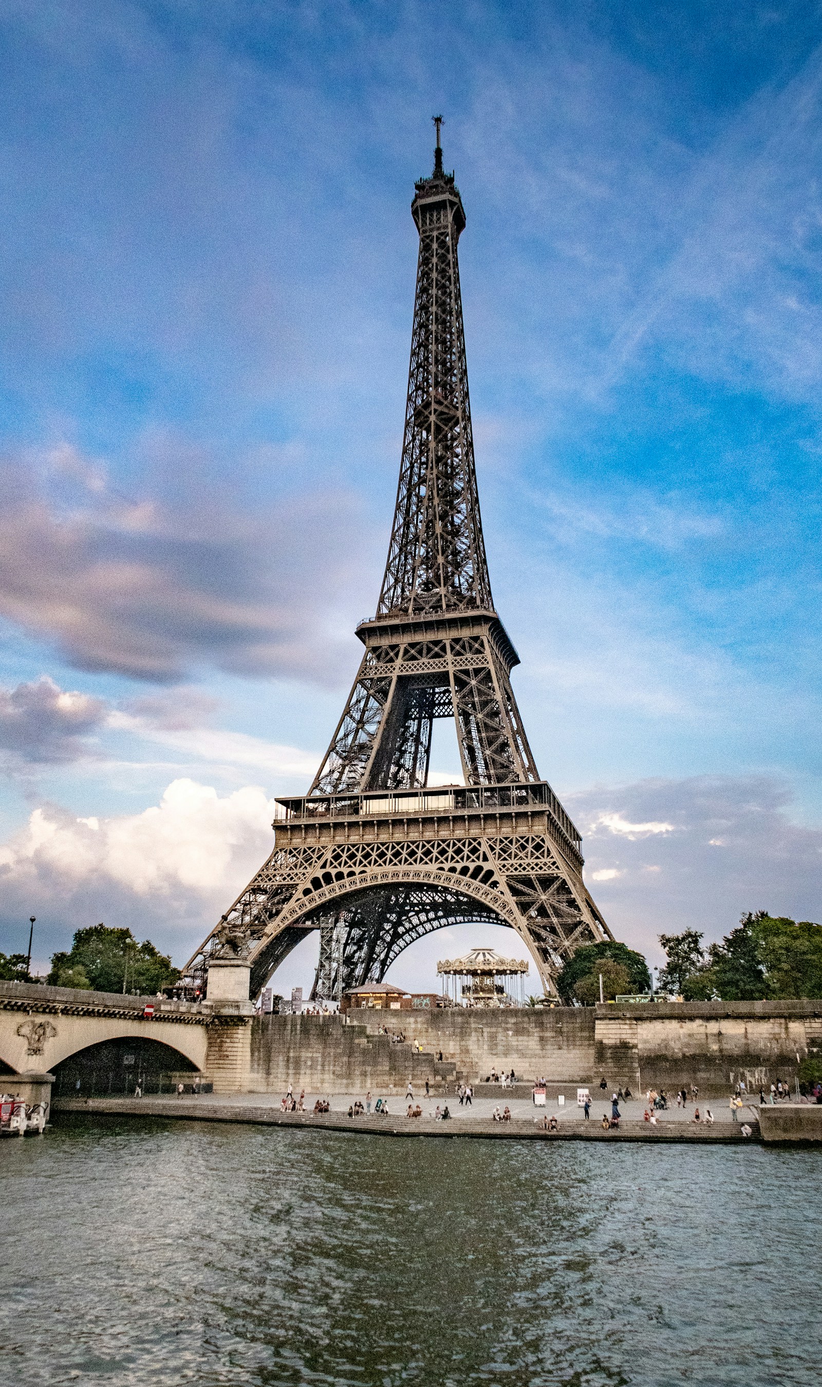 The Eiffel Tower seen across the Seine in Paris during the day