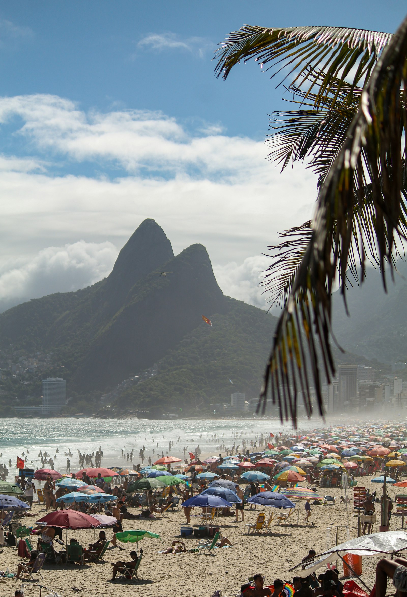 A Rio de Janeiro beach with mountains behind