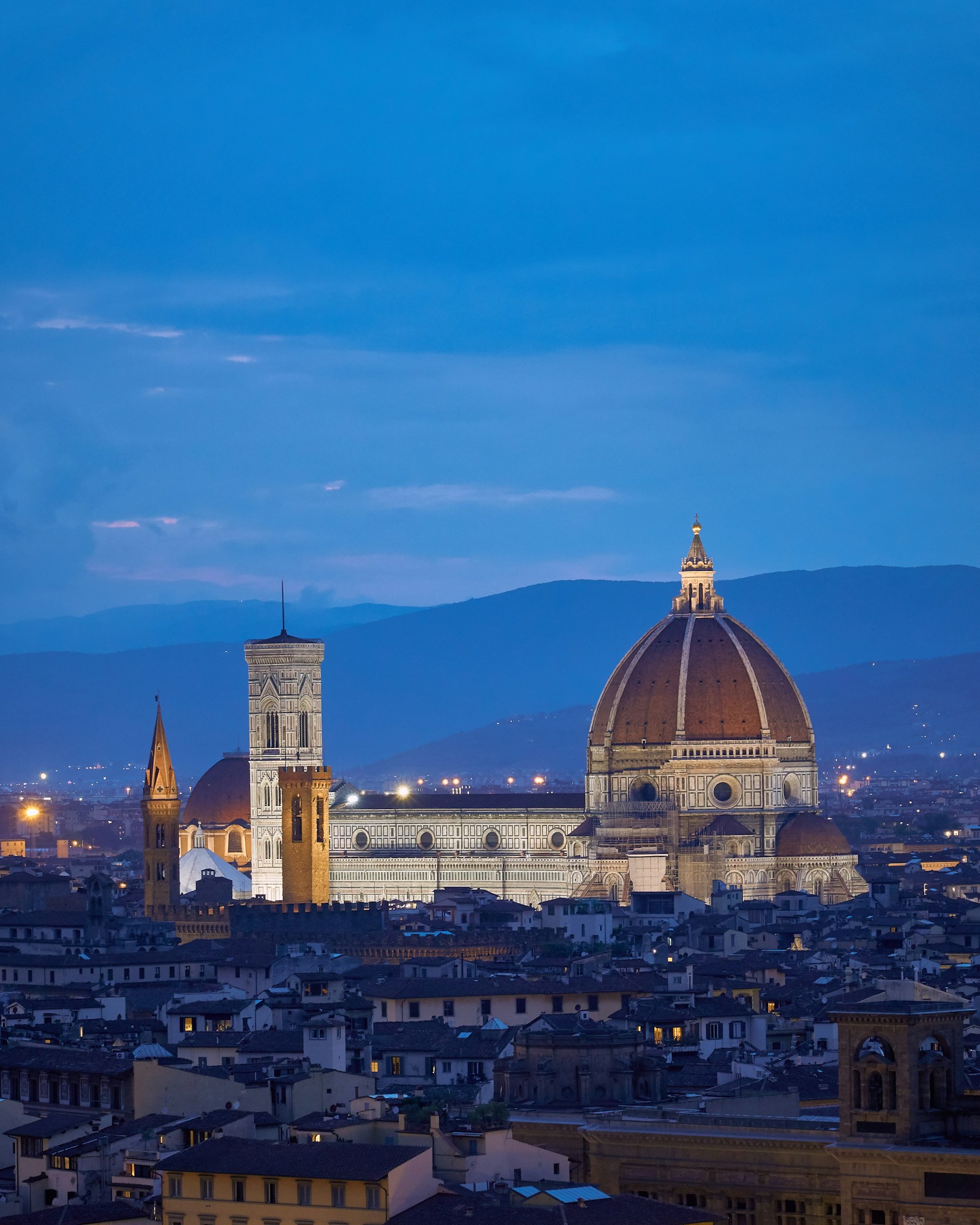 The Florence cathedral lit at night, a day trip from Rome