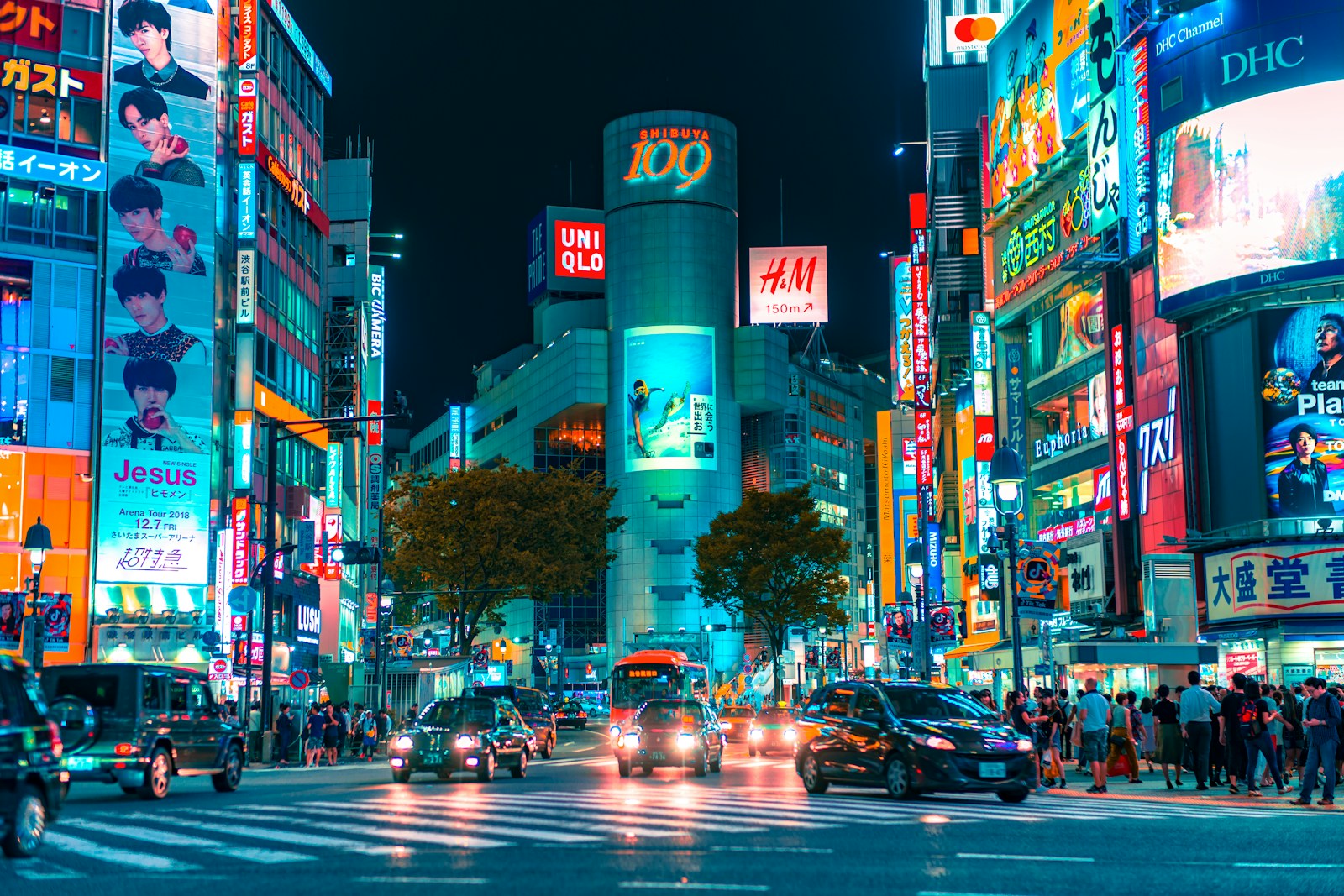 Neon Shibuya intersection at night