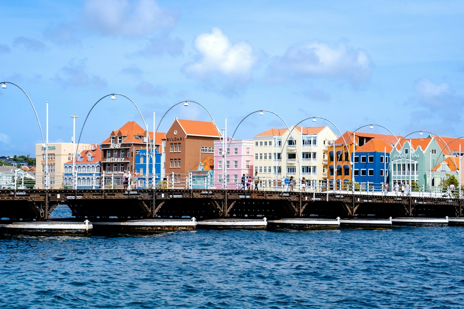 The Queen Emma pontoon bridge and the colourful Handelskade facades in Willemstad, Curacao