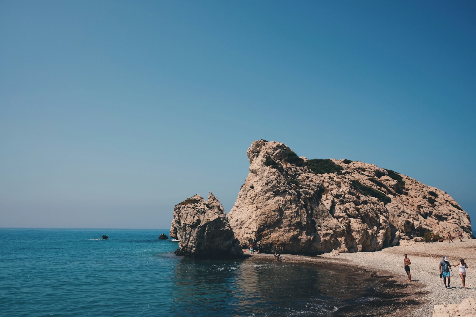 Aphrodite's Rock (Petra tou Romiou) rising from the turquoise sea on the Cyprus coast