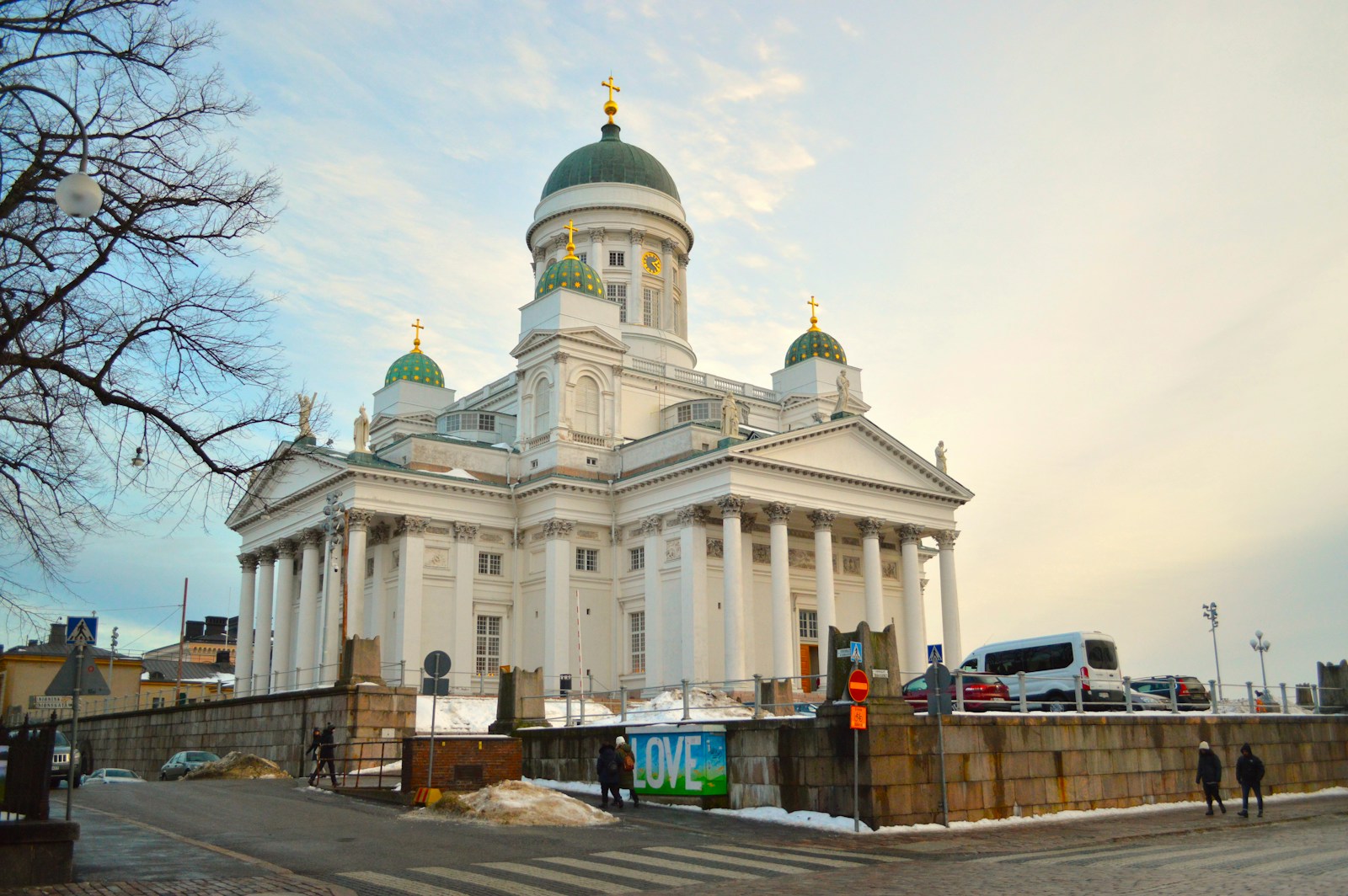 The white Helsinki Cathedral with its green domes on Senate Square