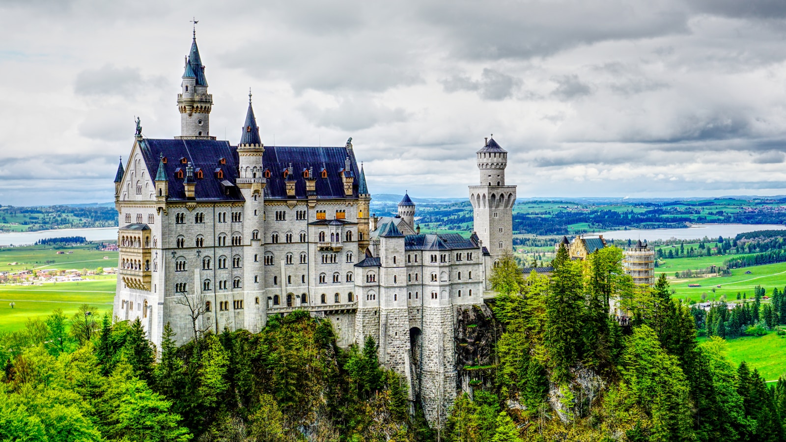Neuschwanstein Castle above the green Bavarian countryside