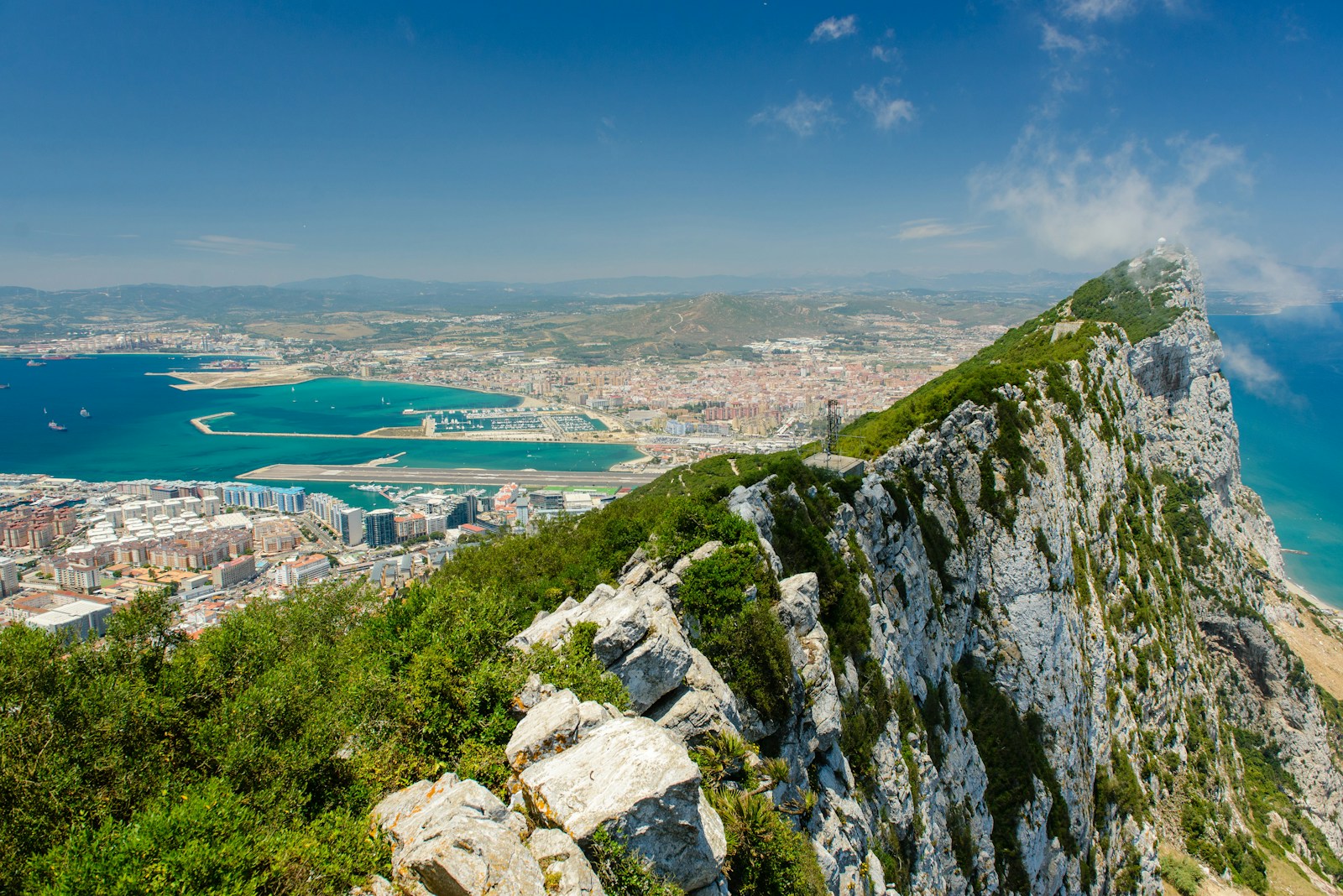 The Rock, the town, and the airport runway crossing the isthmus, Gibraltar