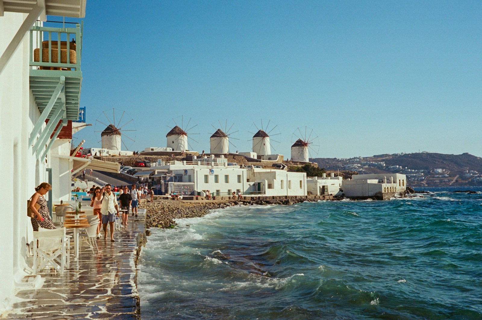 The row of white windmills along the Mykonos waterfront