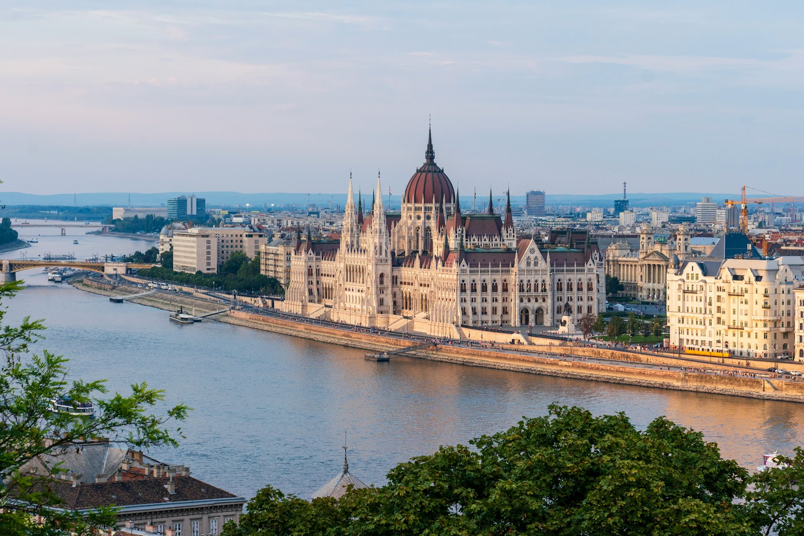 The Hungarian Parliament building on the banks of the Danube in Budapest at golden hour