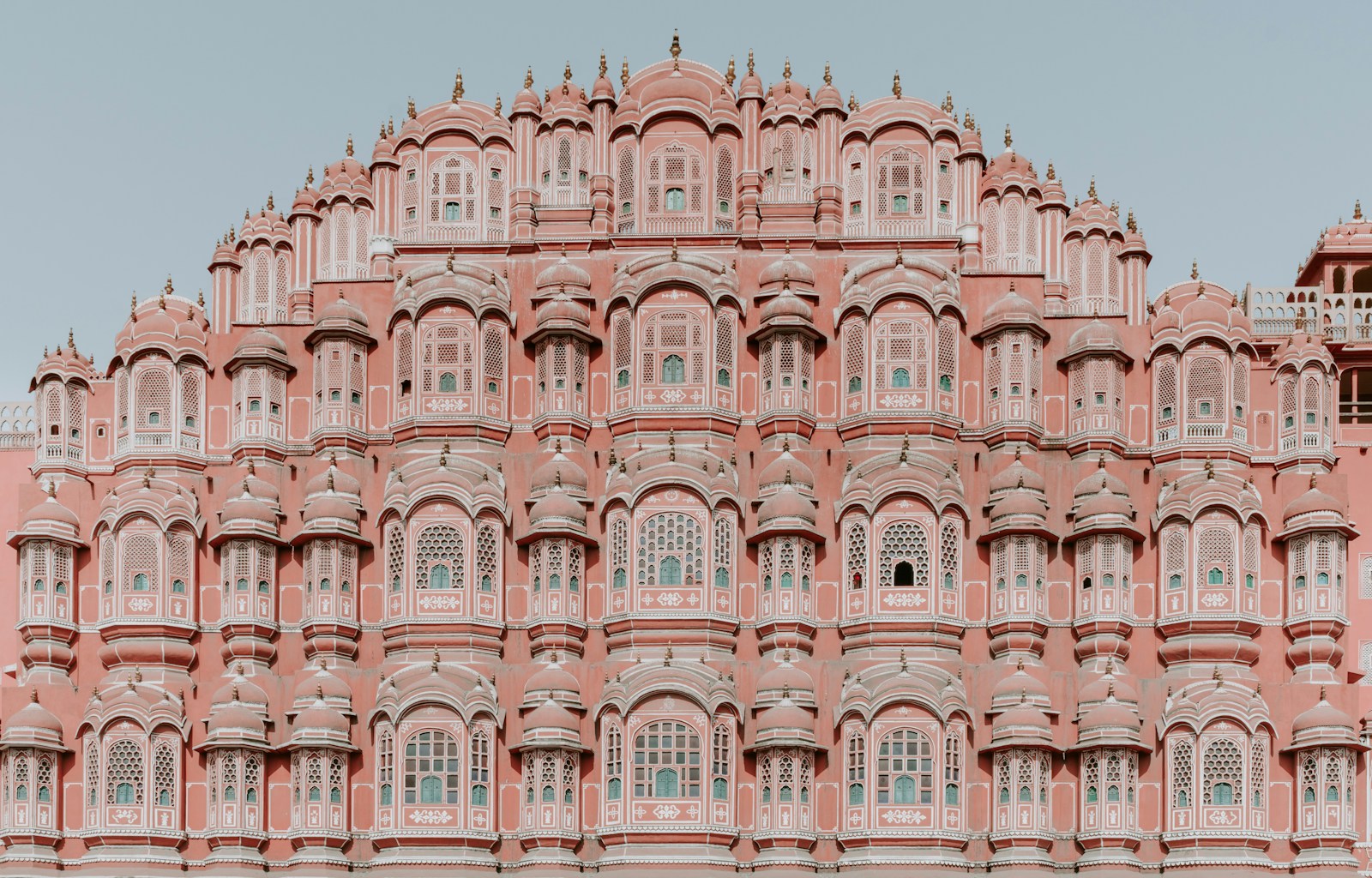 The pink honeycomb facade of the Hawa Mahal in Jaipur