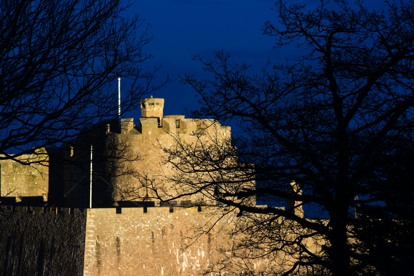 Mont Orgueil (Gorey) Castle lit up at dusk, Jersey