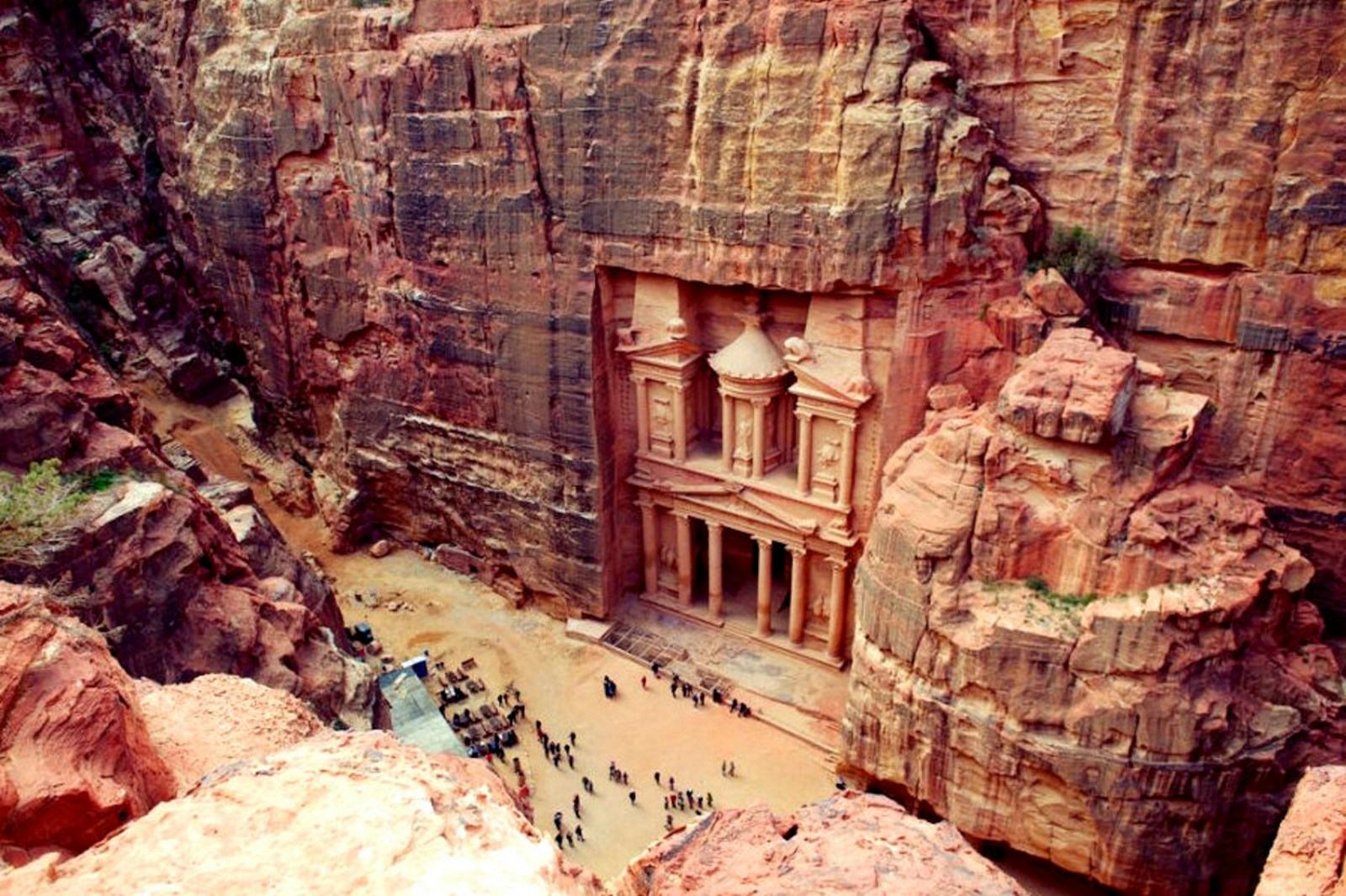 The rose-red Treasury of Petra carved into the canyon wall
