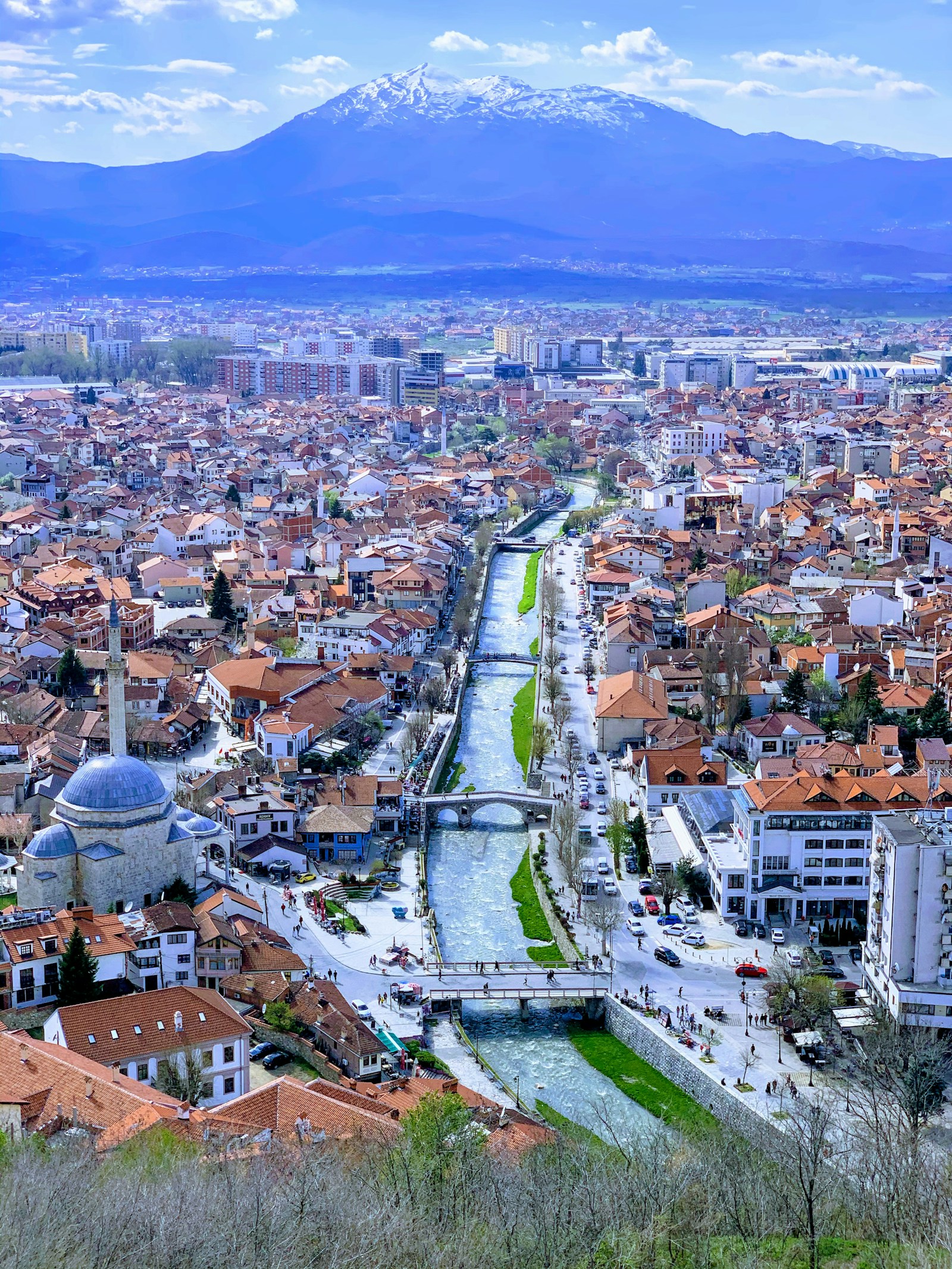 The old town of Prizren along its river with mountains beyond, Kosovo