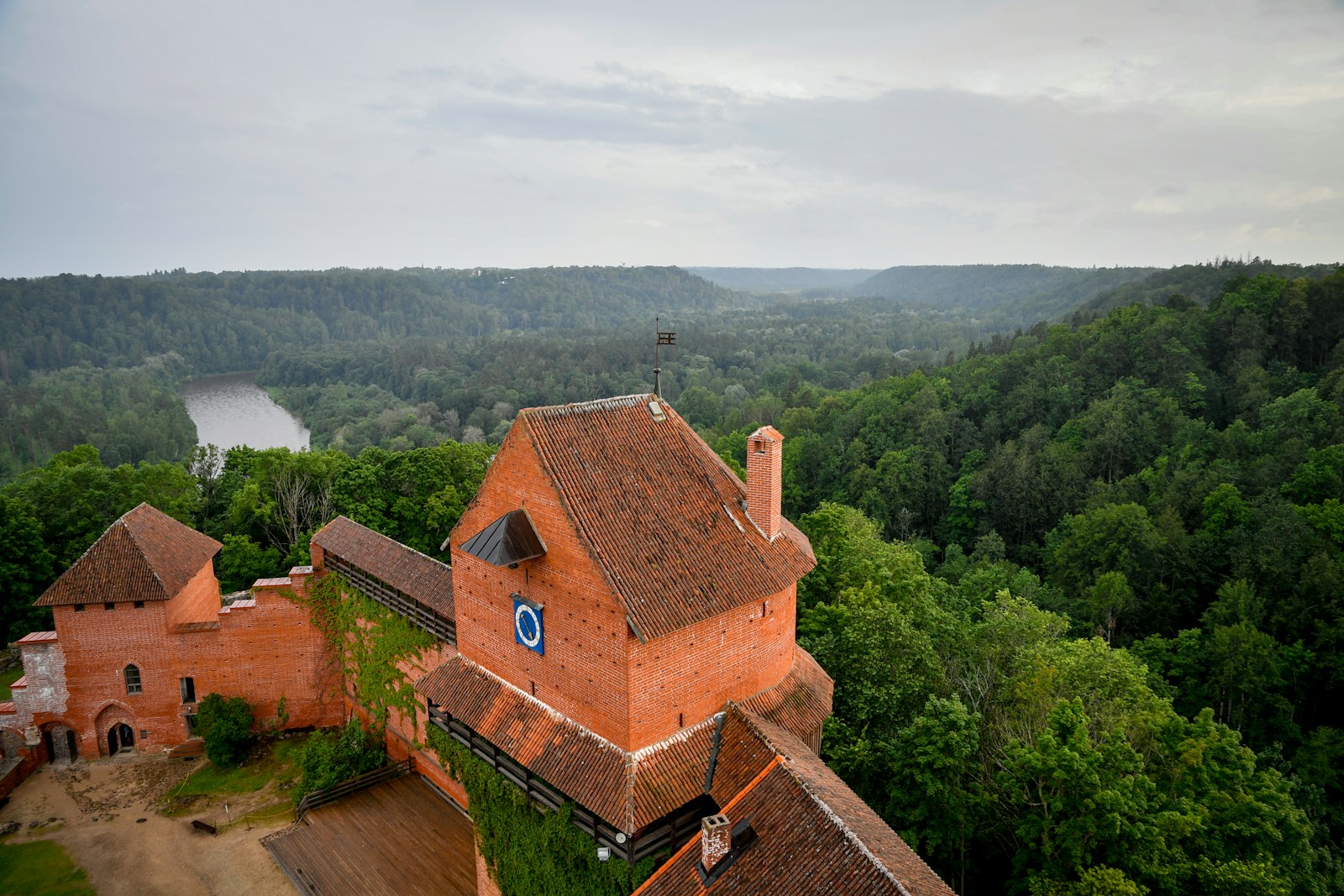 The red-brick Turaida castle above the forested Gauja valley in Latvia