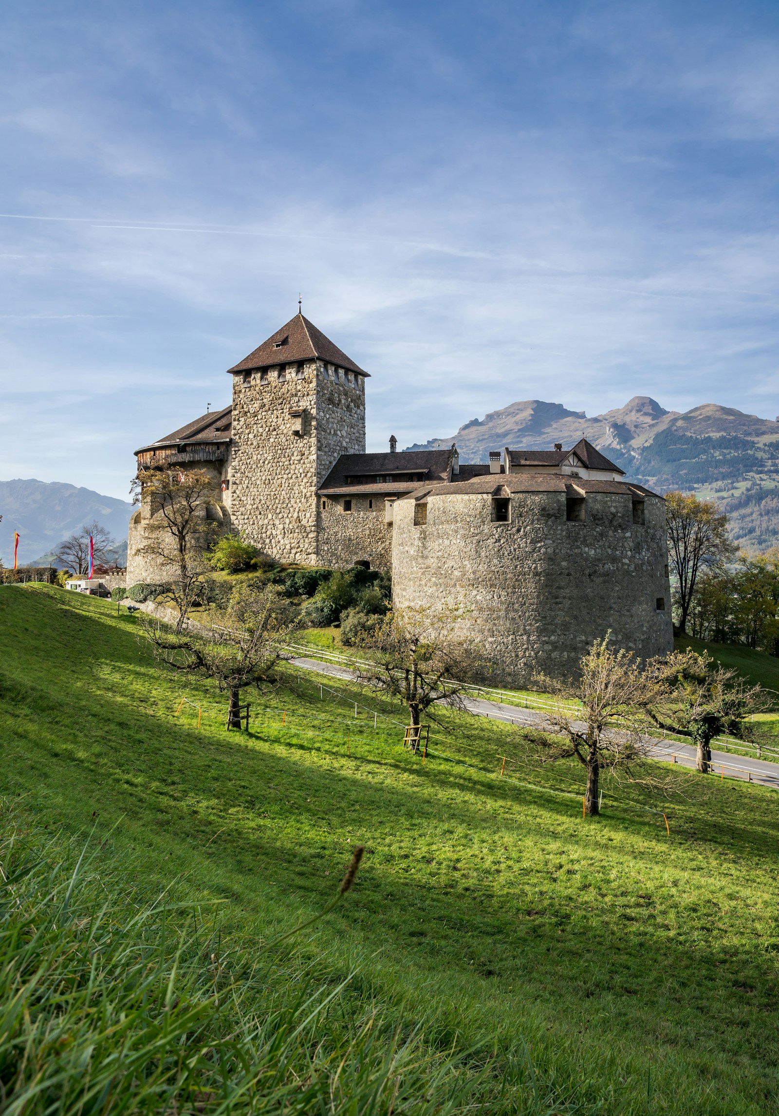 Vaduz Castle on its hillside crag with the Alps behind, Liechtenstein