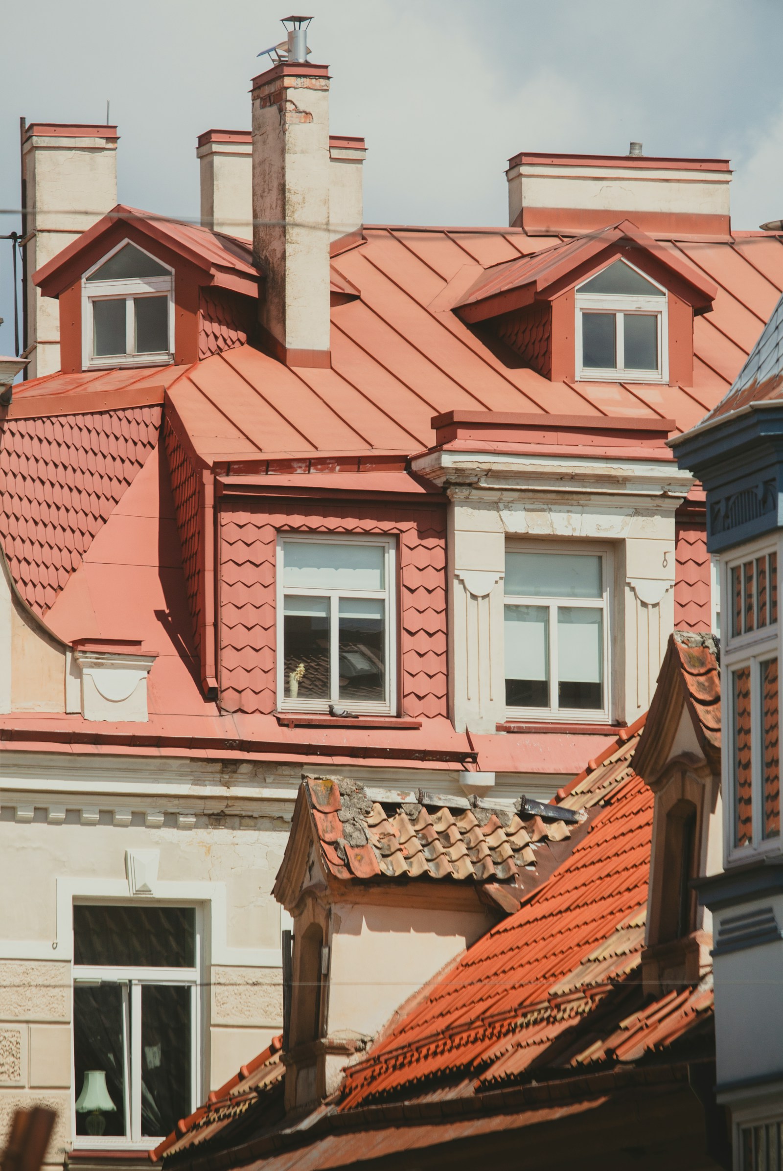 The terracotta rooftops and dormer windows of Vilnius's baroque old town
