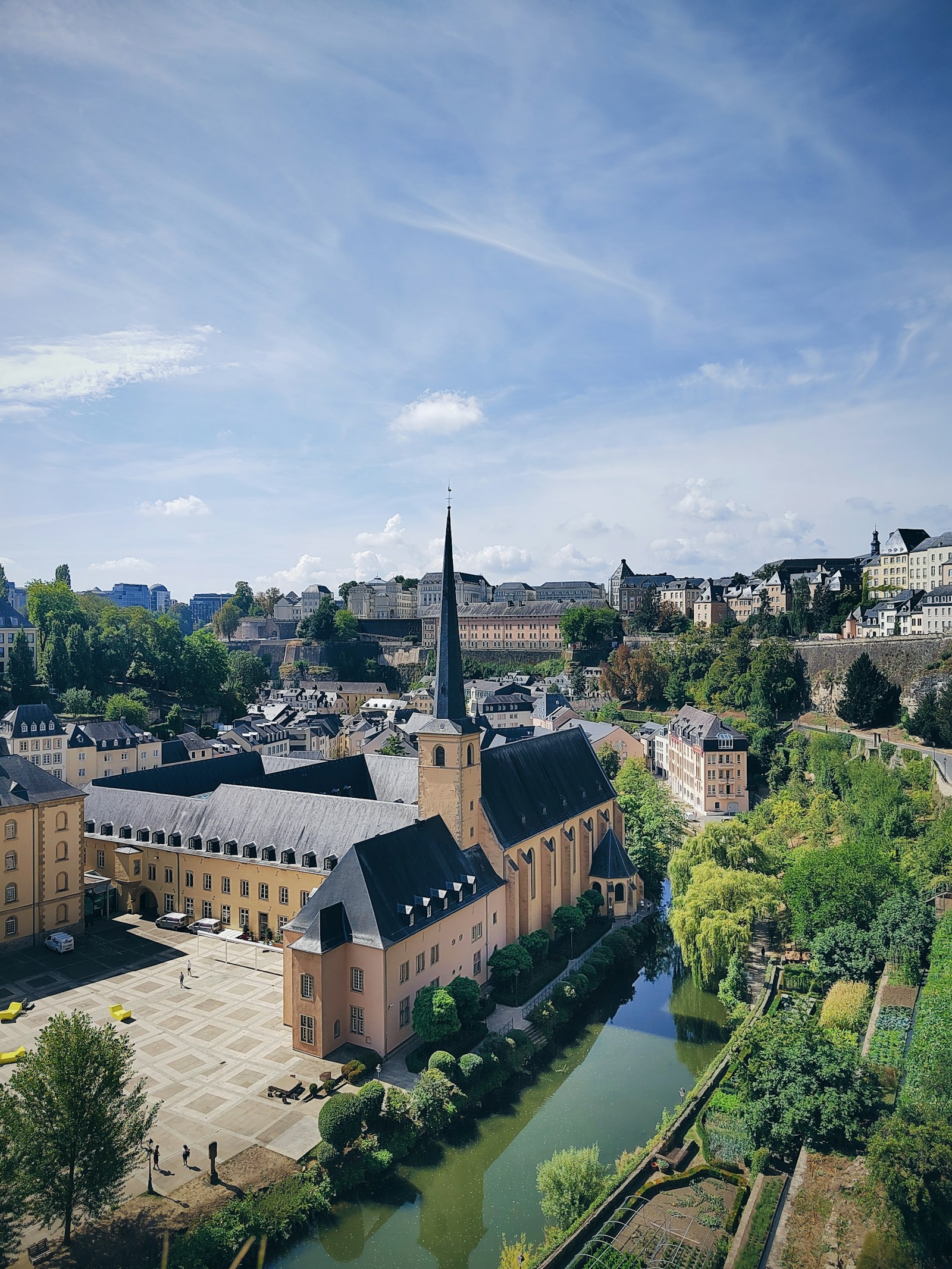 The Grund quarter and Neumunster Abbey in the river gorge below Luxembourg City's fortified old town