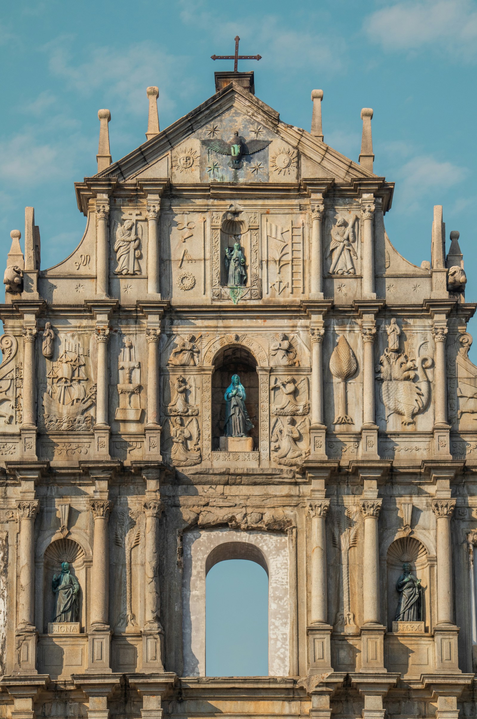 The carved stone facade of the Ruins of St. Paul's, the iconic landmark of Macau