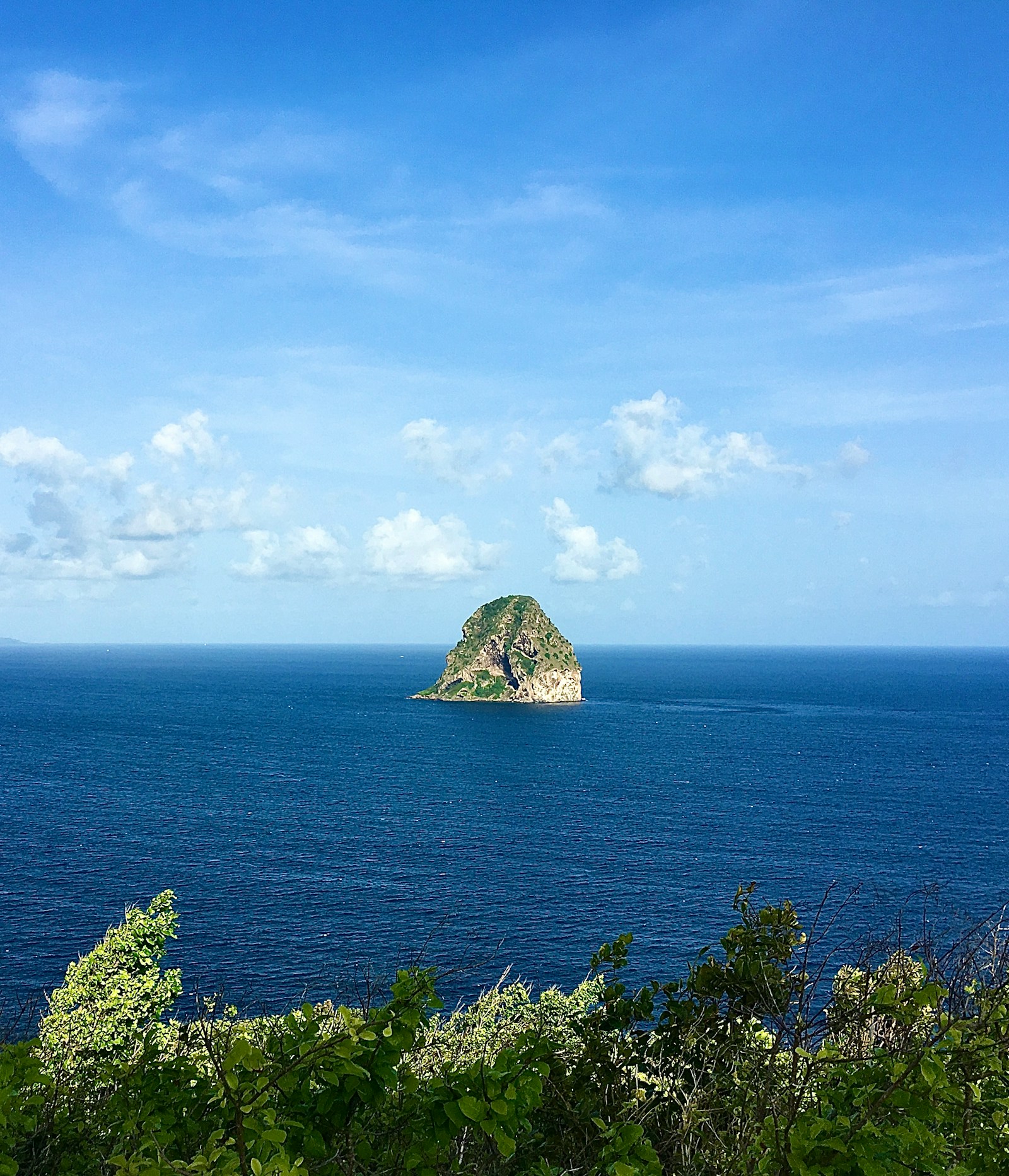 The Rocher du Diamant (Diamond Rock) rising from the blue sea off the south coast, Martinique