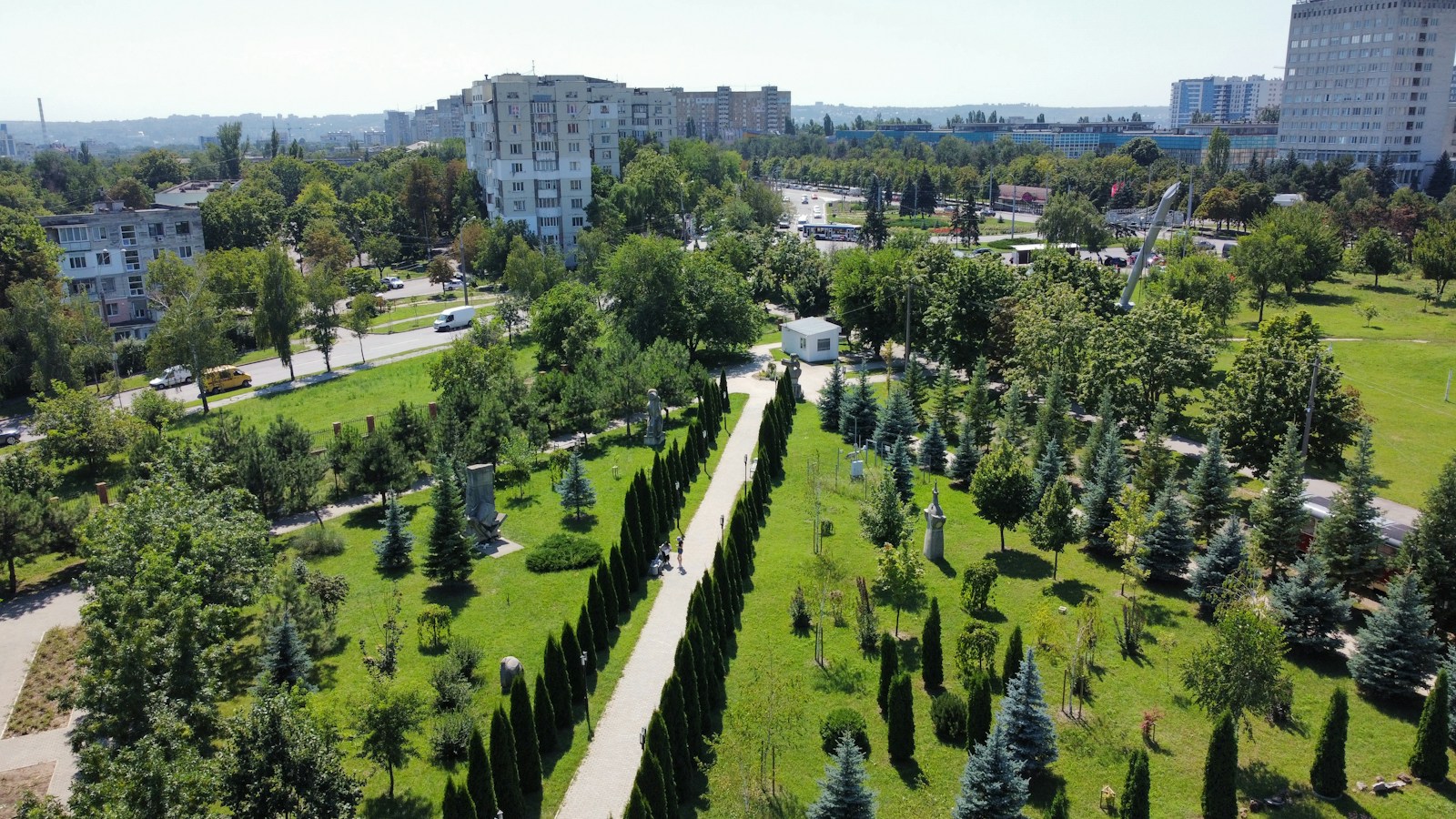 A tree-lined park with statues in central Chisinau, Moldova