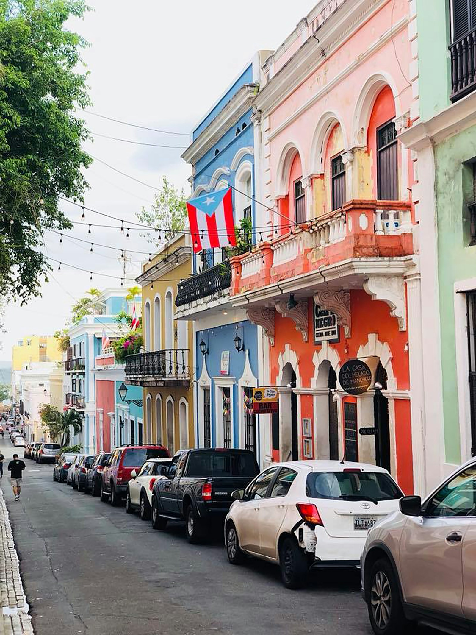 A colourful colonial street with the Puerto Rican flag, Old San Juan