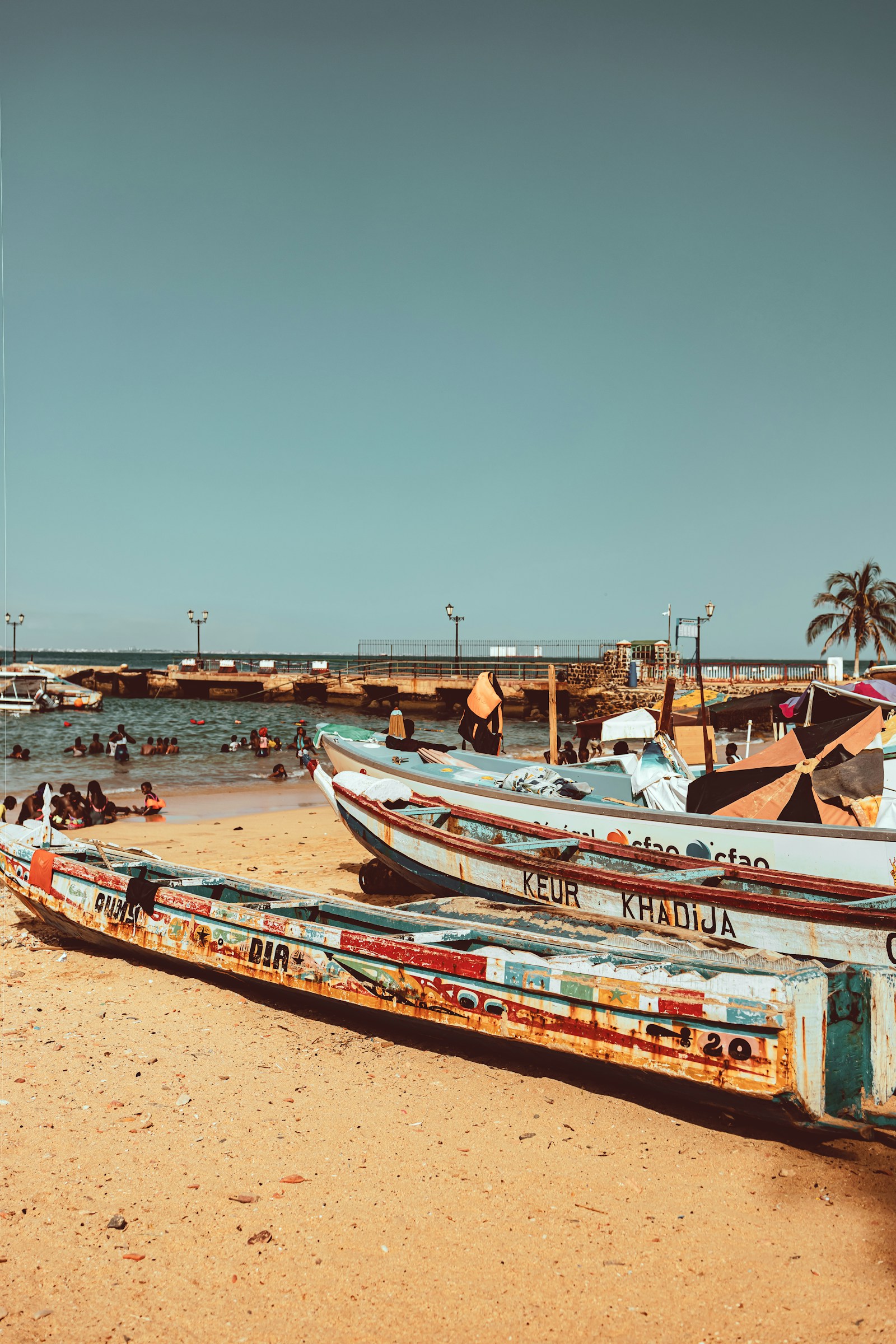 Colourful wooden fishing pirogues on the beach at Dakar, Senegal