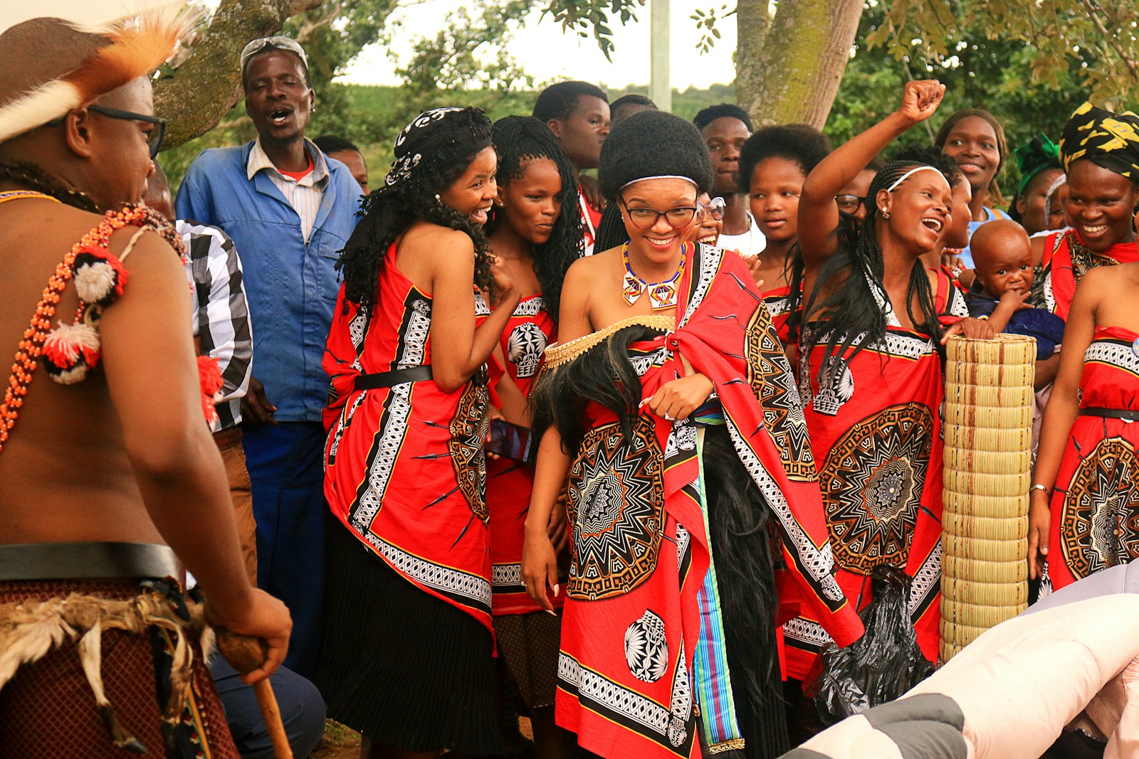 People in traditional Swazi dress celebrating a ceremony at Nhlangano, Eswatini