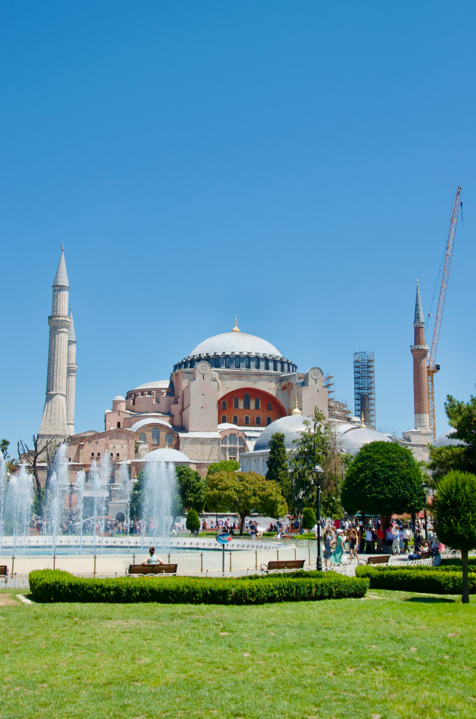 The Hagia Sophia and the Sultanahmet fountains in Istanbul under a blue sky
