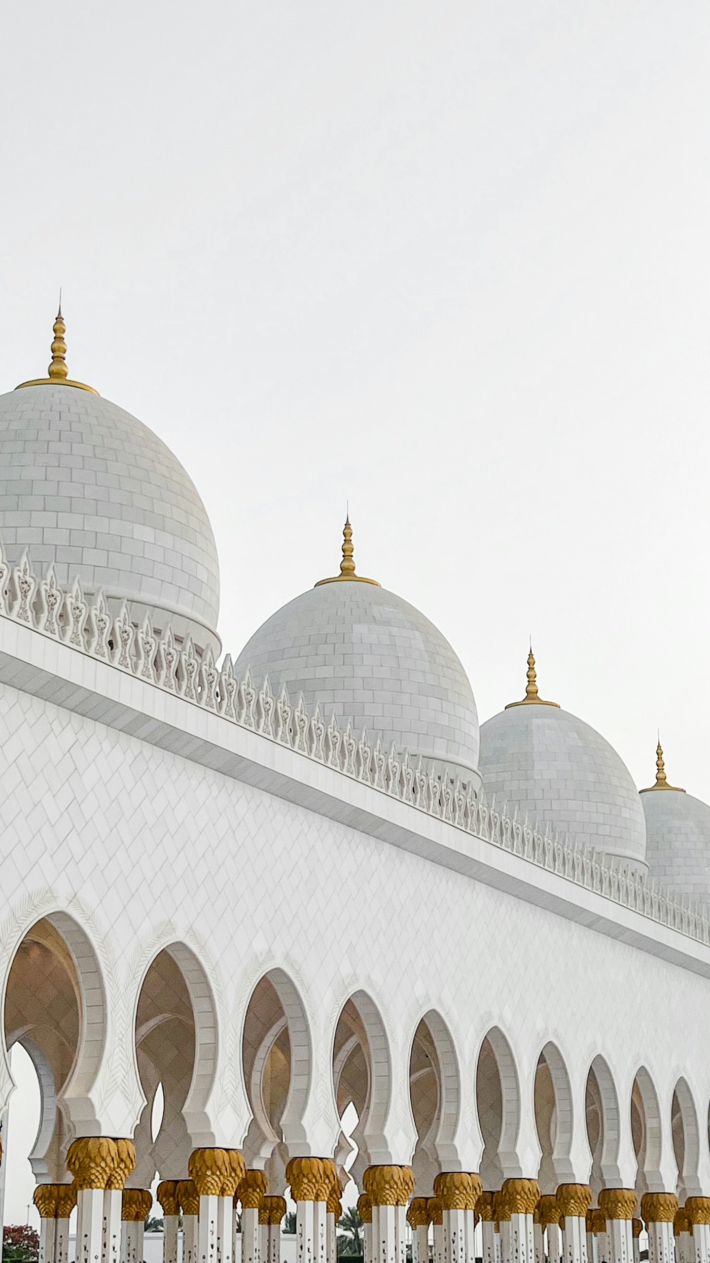 The white domes of the Sheikh Zayed Grand Mosque in Abu Dhabi