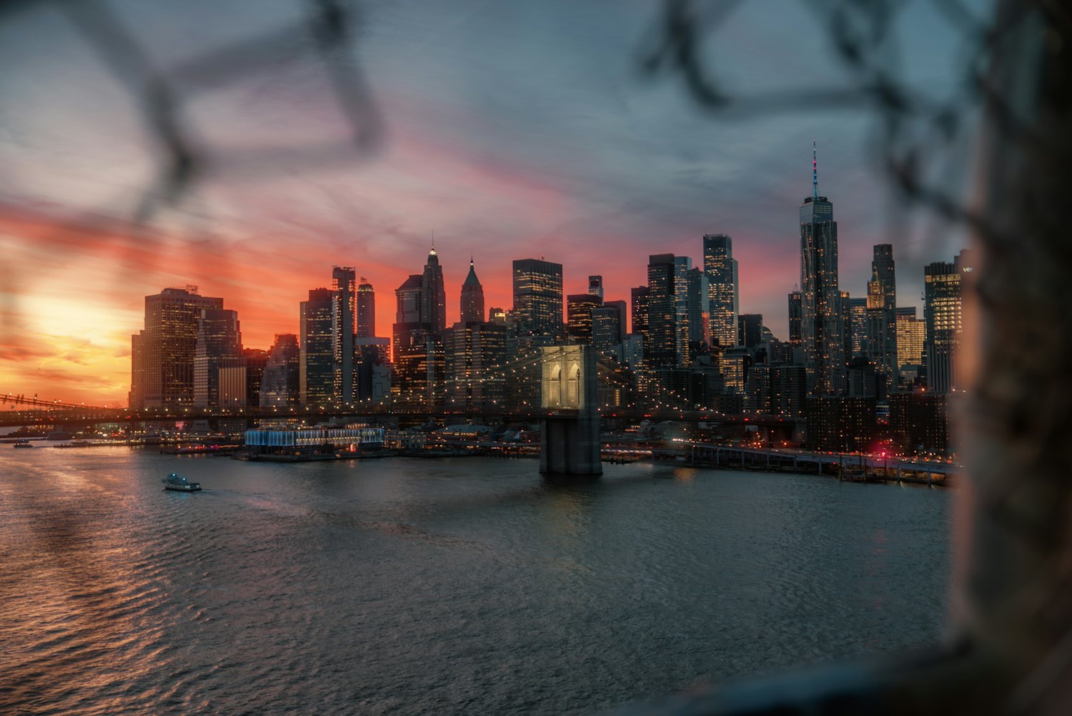 New York City skyline at sunset seen across the water