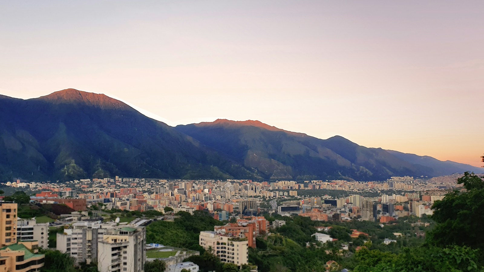 Caracas at dusk below the Avila mountain, Venezuela